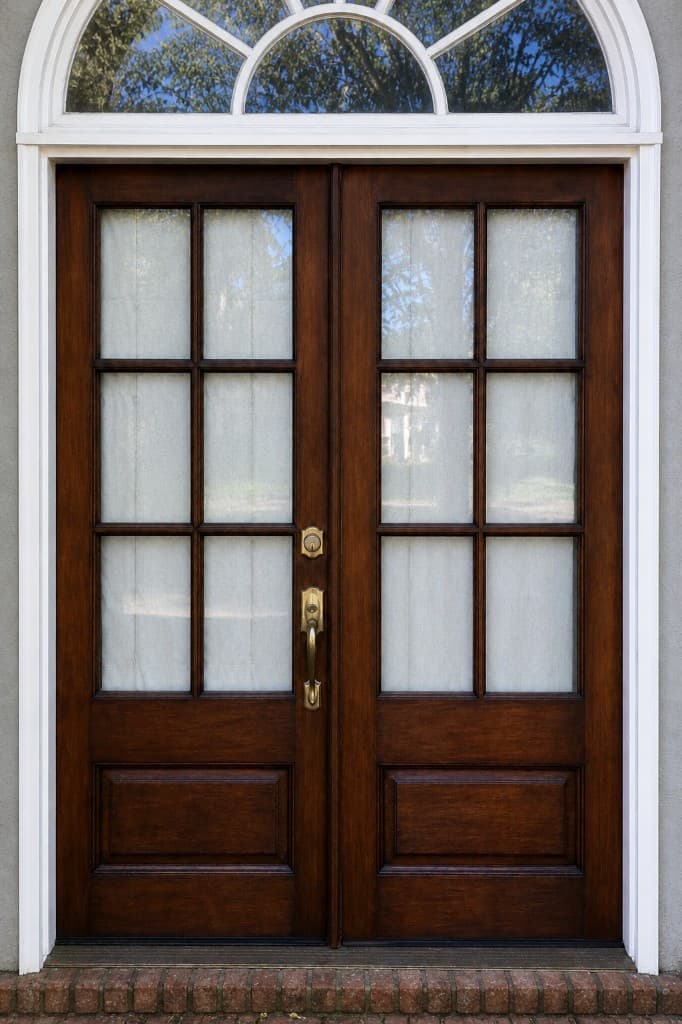 Weathered Double Door Refinish after Churchkey Refinishing in Covington, LA