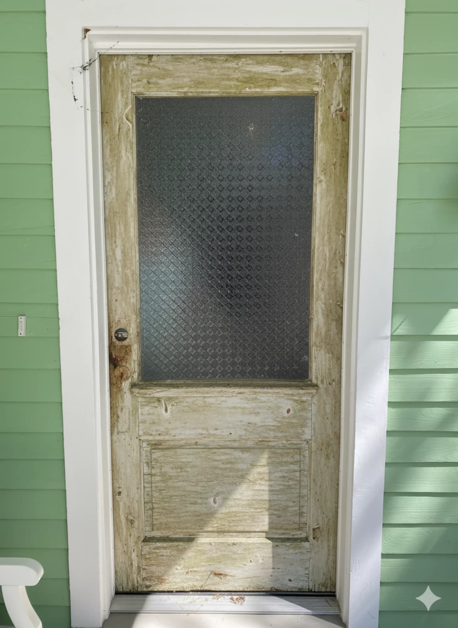 Historic Cypress Door Refinishing before refinishing in Historic Old Mandeville mansion, Mandeville, LA