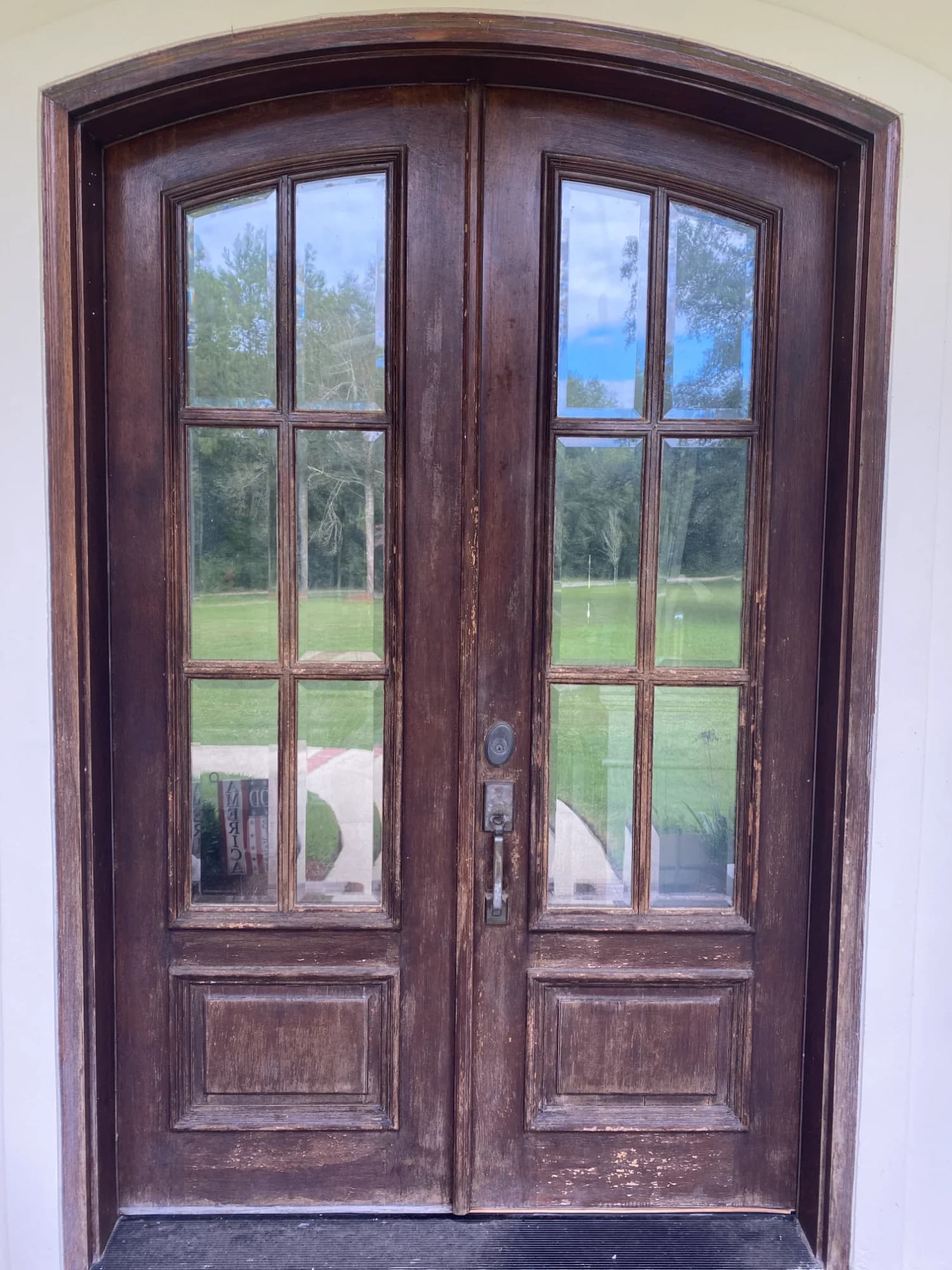 Mandeville Mahogany Door Restoration before refinishing in Mandeville, LA
