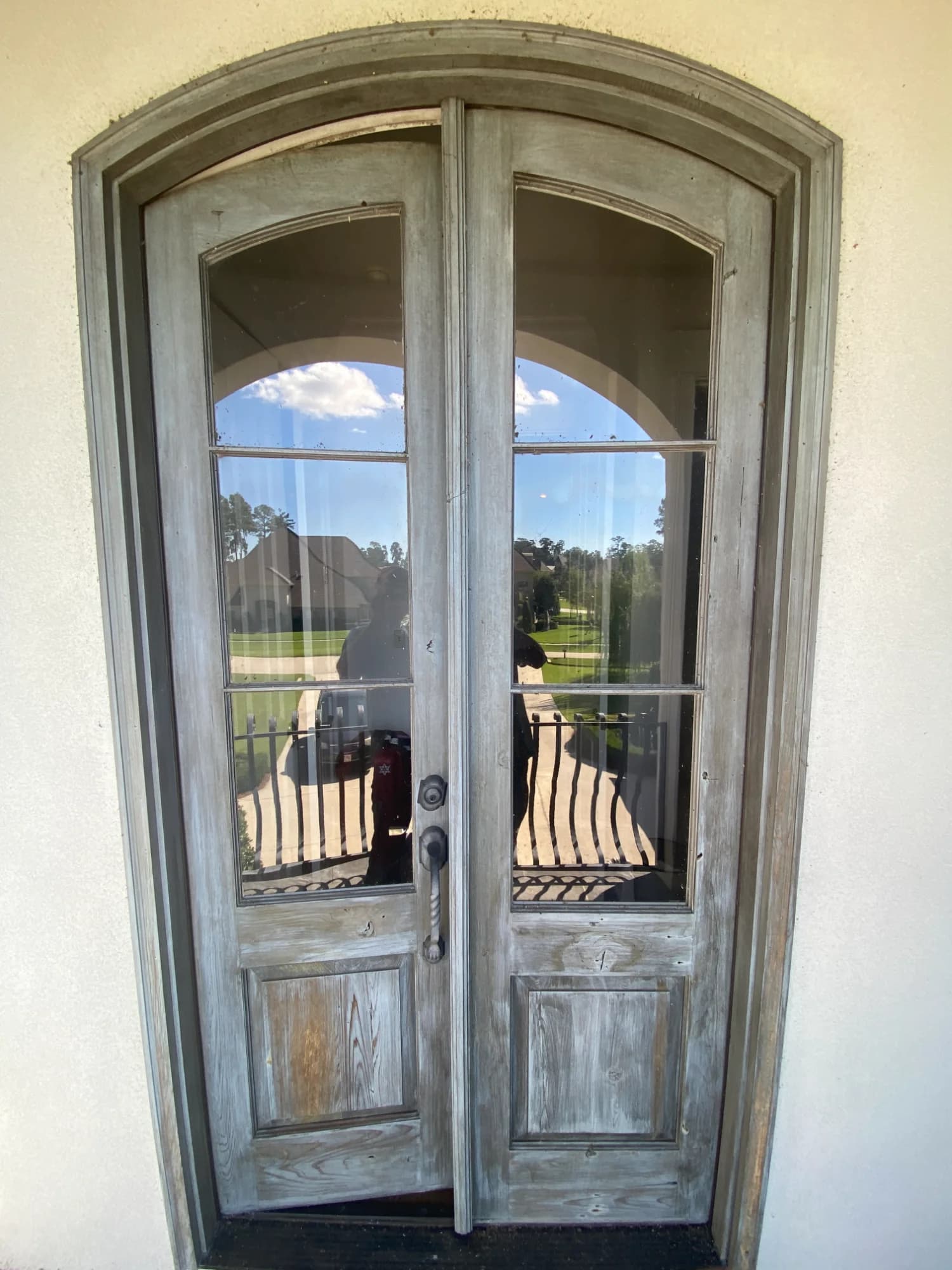 Front Door Refinishing before refinishing in Mandeville, LA